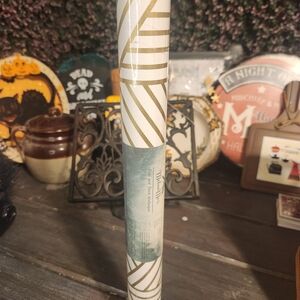 Gold and White Wrapping Paper Roll